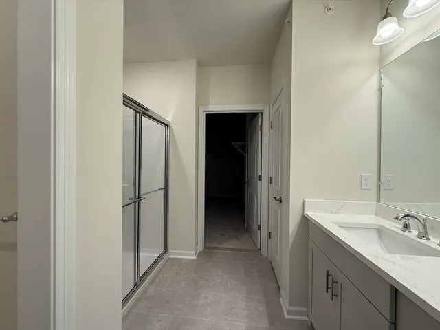 a view of a bathroom from the hallway