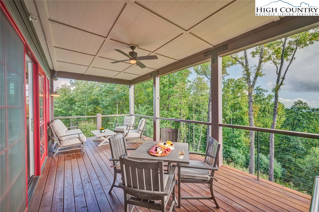 188 Ramblestone Terrace, Unit 101 Boone, NC 28607 - Photo 19 of 48 a view of a dining room with furniture window and outside view
