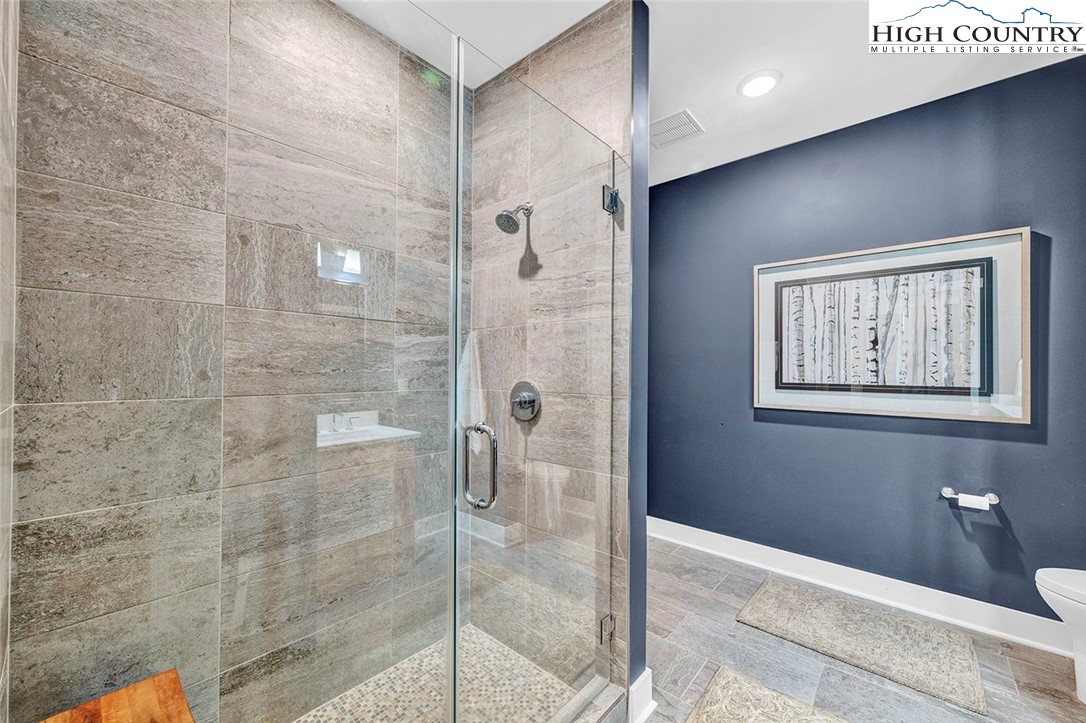 188 Ramblestone Terrace, Unit 101 Boone, NC 28607 - Photo 28 of 48 a bathroom with a shower