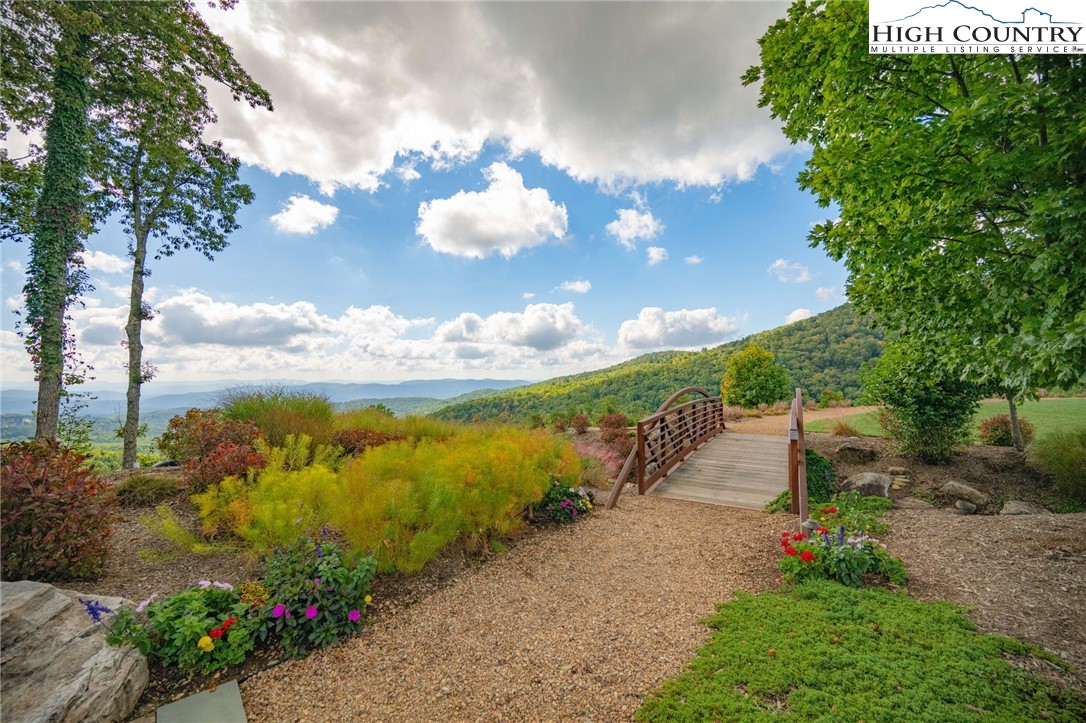 188 Ramblestone Terrace, Unit 101 Boone, NC 28607 - Photo 40 of 48 a view of a pathway with a yard