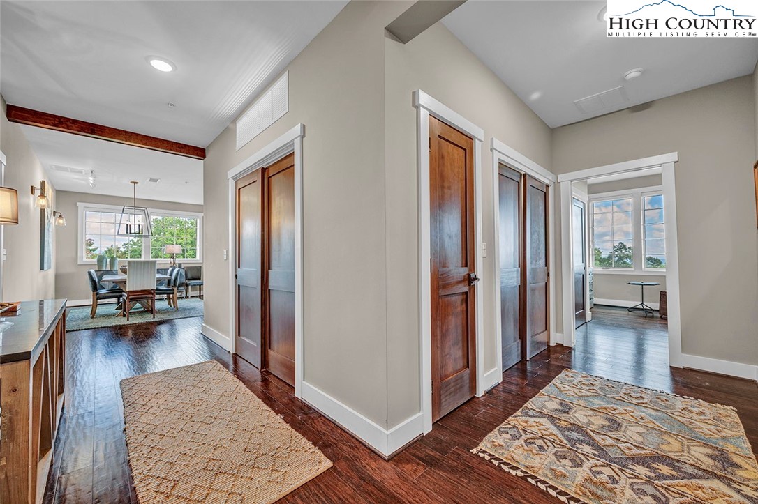 188 Ramblestone Terrace, Unit 101 Boone, NC 28607 - Photo 4 of 48 a view of a hallway and a livingroom with furniture