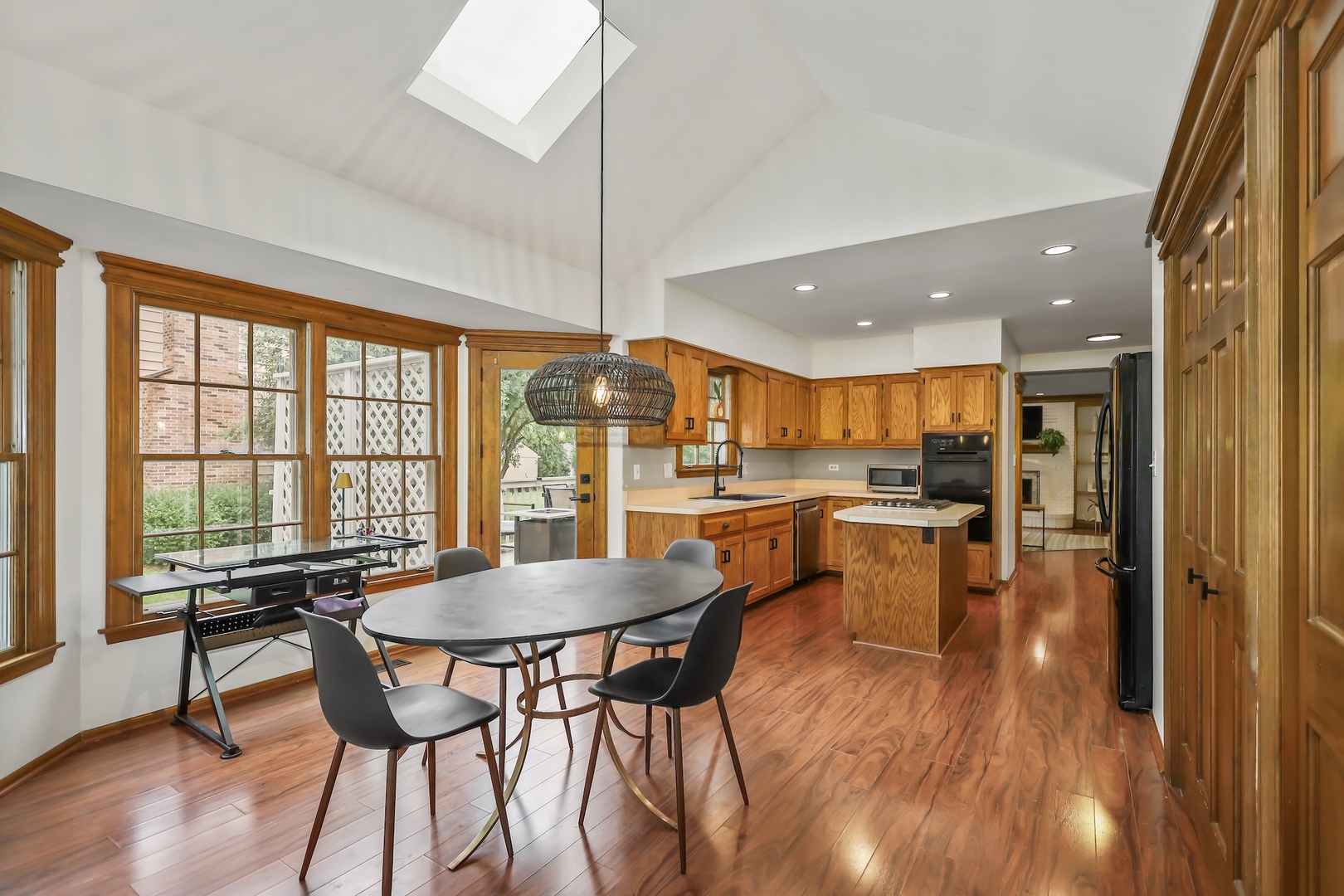 1091 Danforth Drive Batavia, IL 60510 - Photo 15 of 40 a dining room with furniture and wooden floor