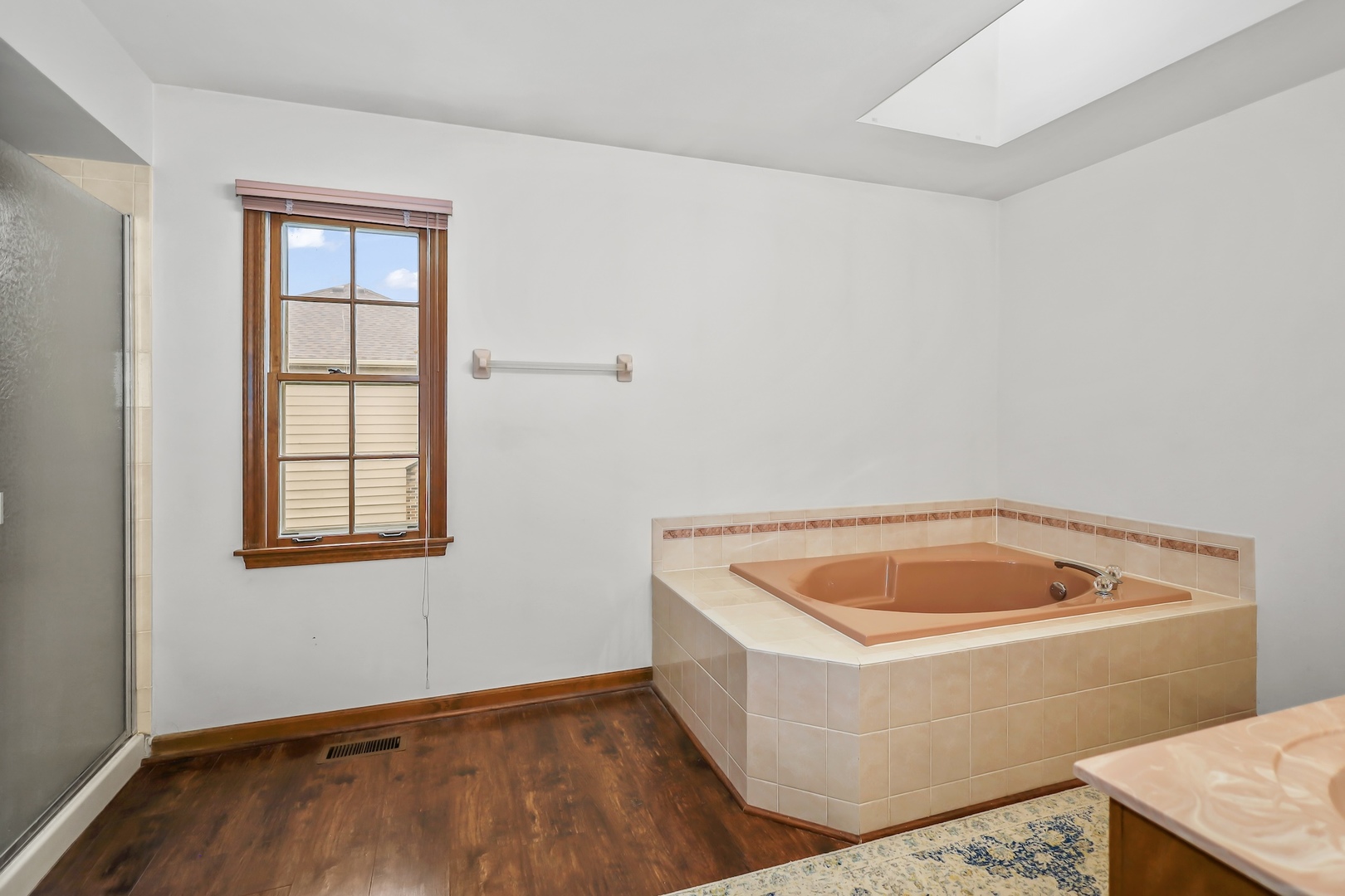 1091 Danforth Drive Batavia, IL 60510 - Photo 23 of 40 a room with window and exposed radiator