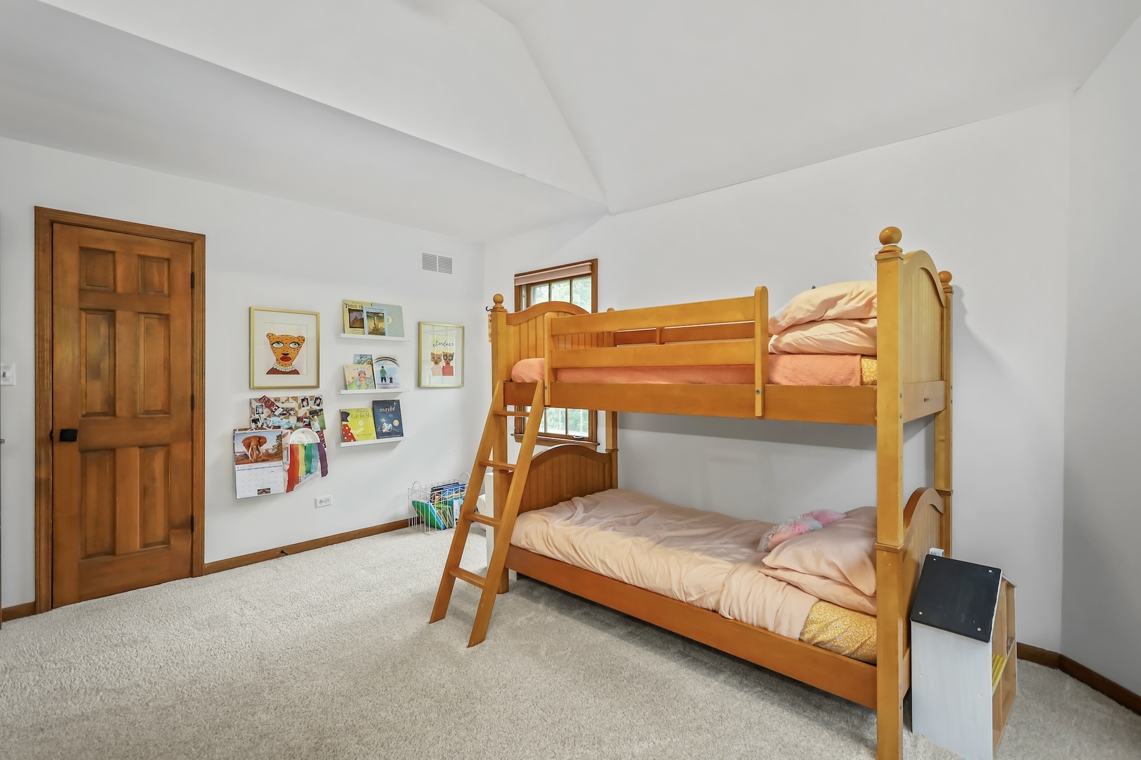 1091 Danforth Drive Batavia, IL 60510 - Photo 27 of 40 a bedroom with a bed and wooden floor