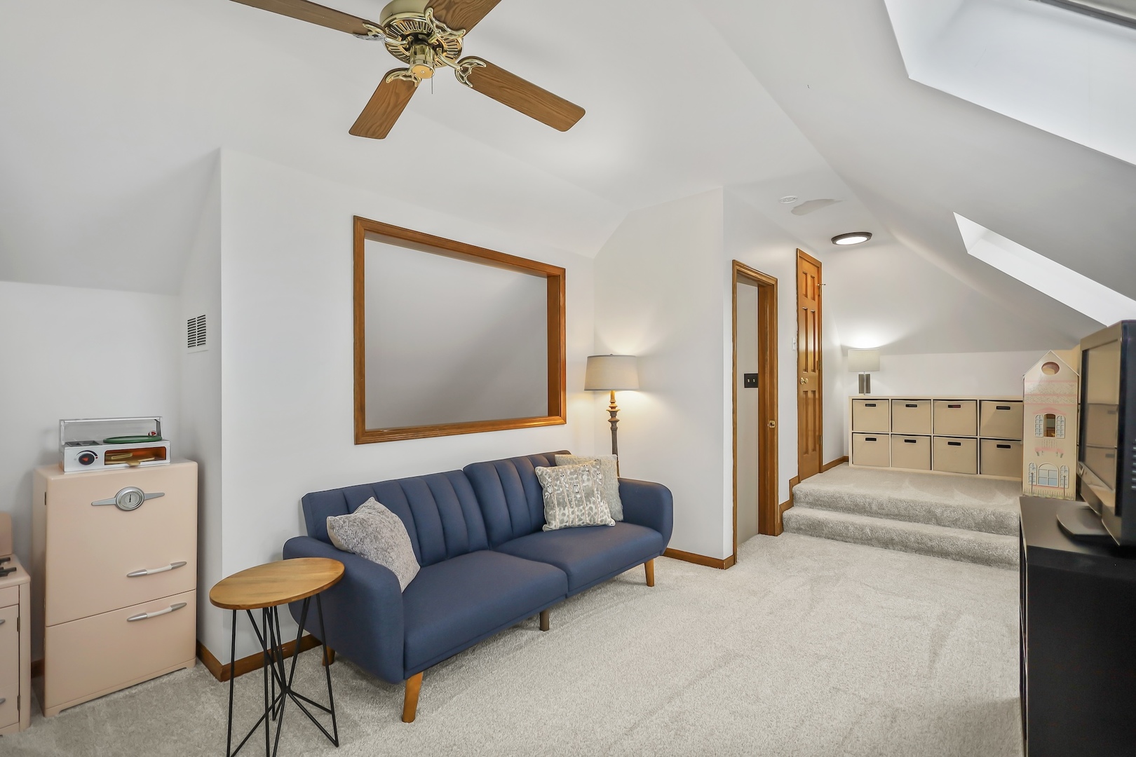 1091 Danforth Drive Batavia, IL 60510 - Photo 29 of 40 a living room with furniture and a chandelier