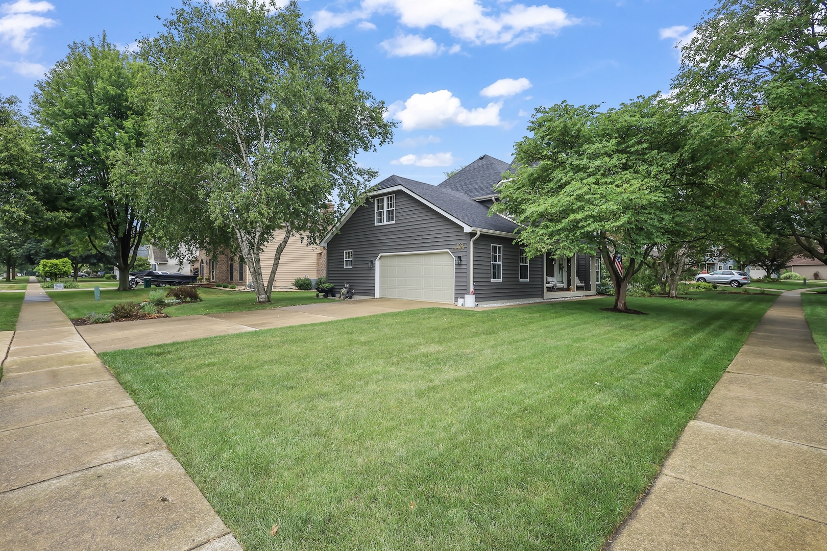 1091 Danforth Drive Batavia, IL 60510 - Photo 35 of 40 a front view of a house with a yard