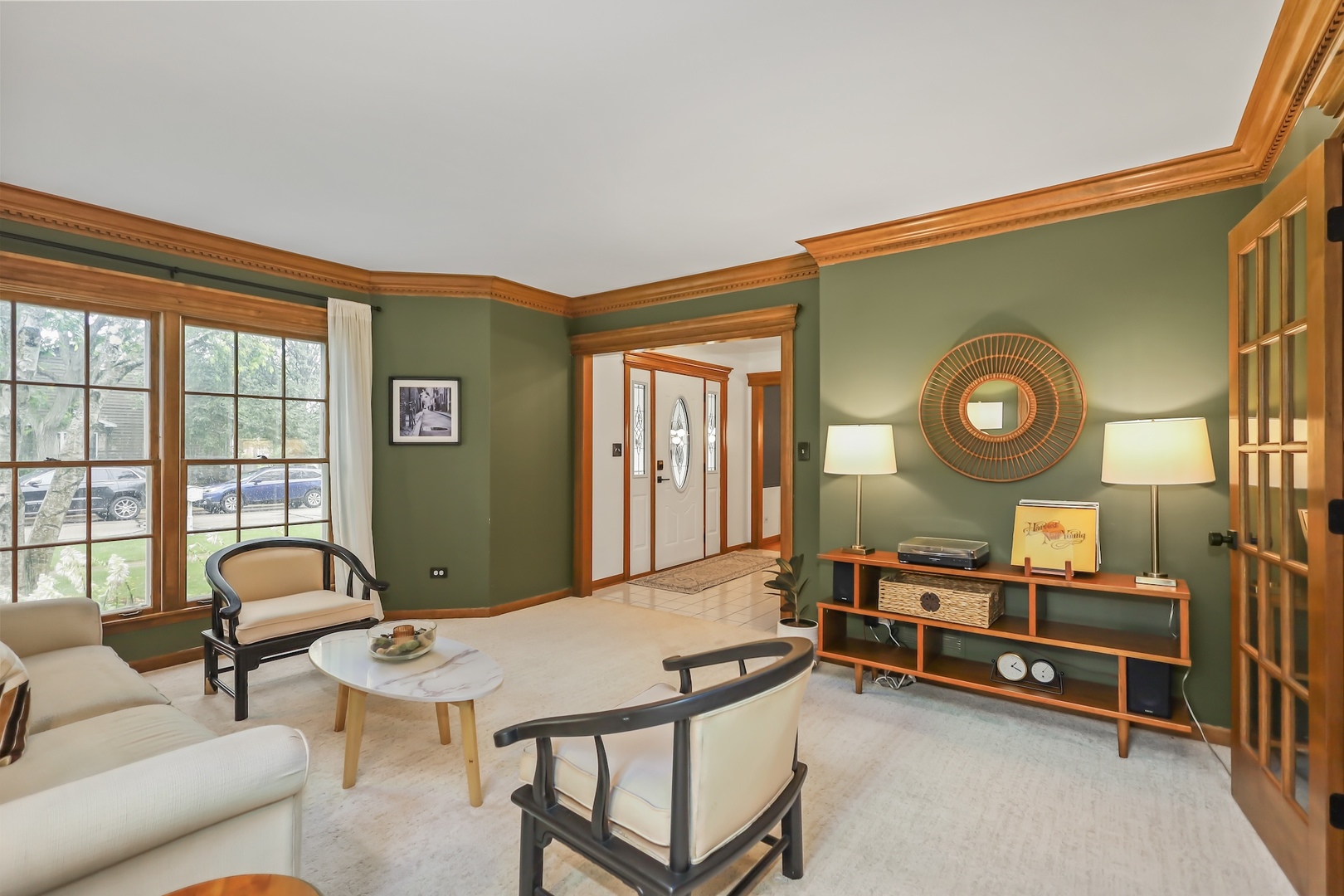 1091 Danforth Drive Batavia, IL 60510 - Photo 7 of 40 a living room with furniture a rug and a large window