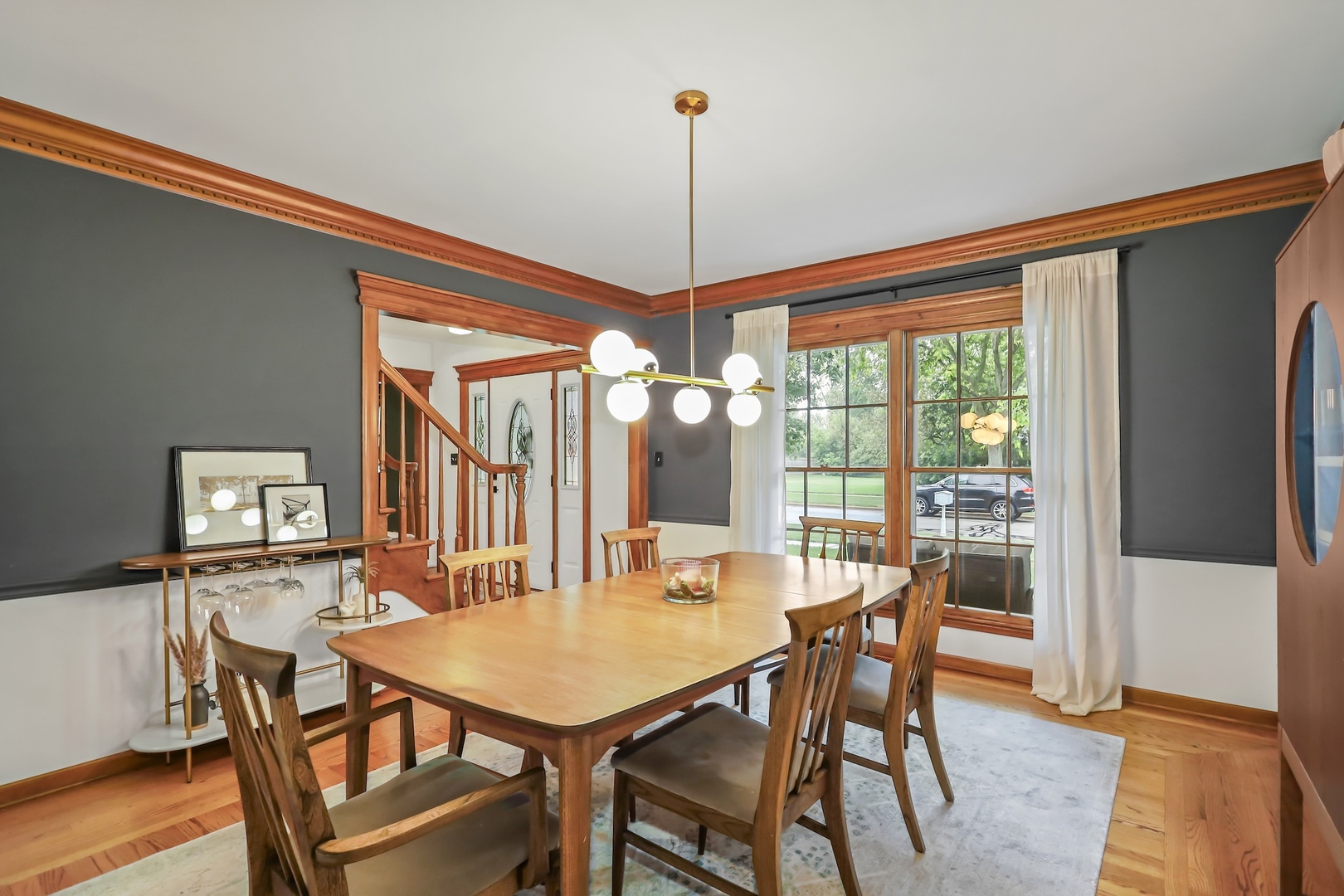 1091 Danforth Drive Batavia, IL 60510 - Photo 9 of 40 a view of a dining room with furniture window and wooden floor