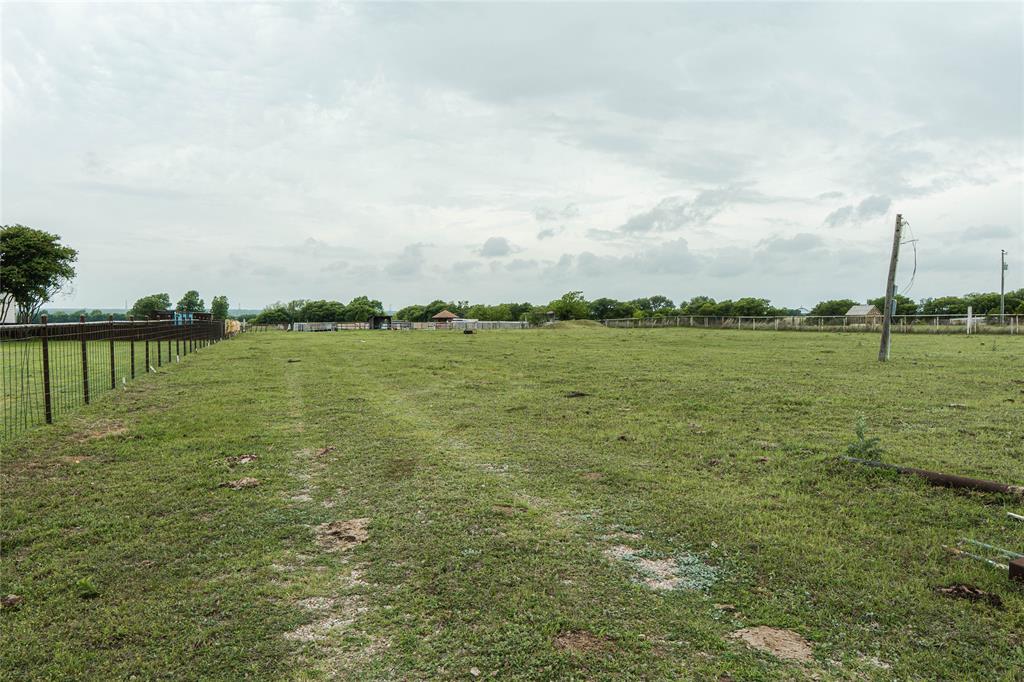 390 Anderson Road Waxahachie, TX 75167 - Photo 9 of 13 a view of a lake with houses in the background