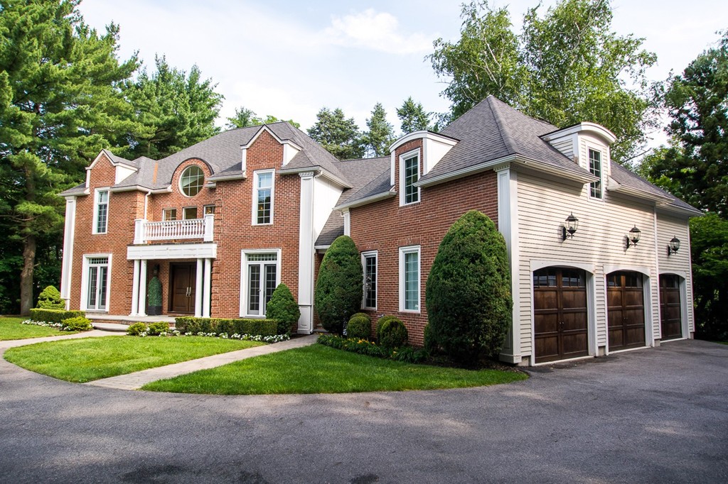 41 Cutler Lane Brookline, MA 02467 - Photo 12 of 12 front view of a house with a yard