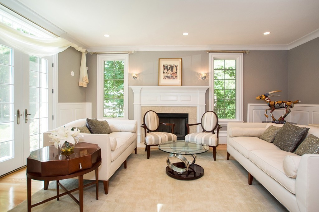 41 Cutler Lane Brookline, MA 02467 - Photo 5 of 12 a living room with furniture and a fireplace
