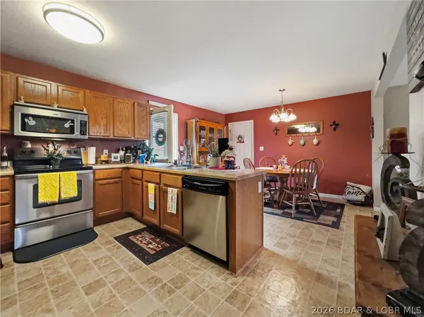 $299,500 | 150 Kinchlow Ranch Drive, Sunrise Beach, MO 65079