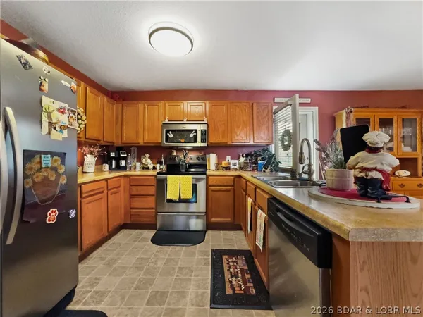 $299,500 | 150 Kinchlow Ranch Drive, Sunrise Beach, MO 65079