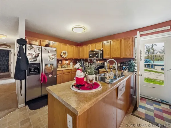 $299,500 | 150 Kinchlow Ranch Drive, Sunrise Beach, MO 65079