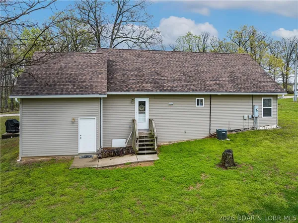 $299,500 | 150 Kinchlow Ranch Drive, Sunrise Beach, MO 65079