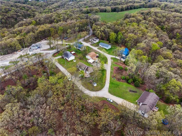 $299,500 | 150 Kinchlow Ranch Drive, Sunrise Beach, MO 65079