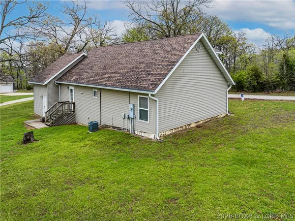 $299,500 | 150 Kinchlow Ranch Drive, Sunrise Beach, MO 65079