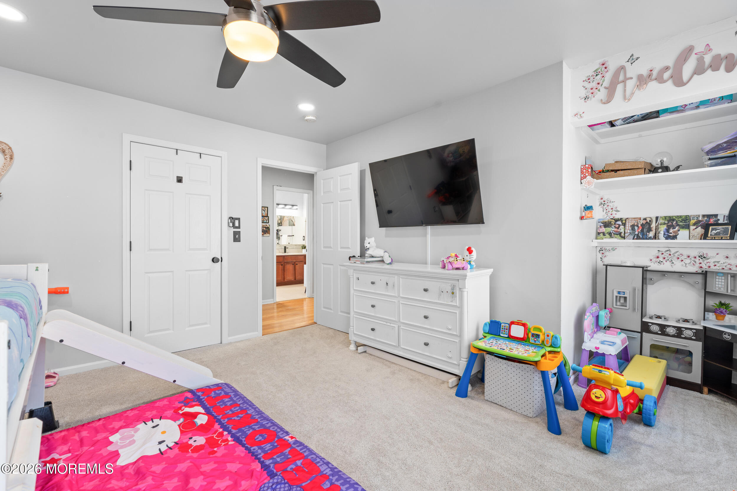 207 Lower Main Street Matawan, NJ 07747 - Photo 15 of 19 a living room with furniture and a flat screen tv