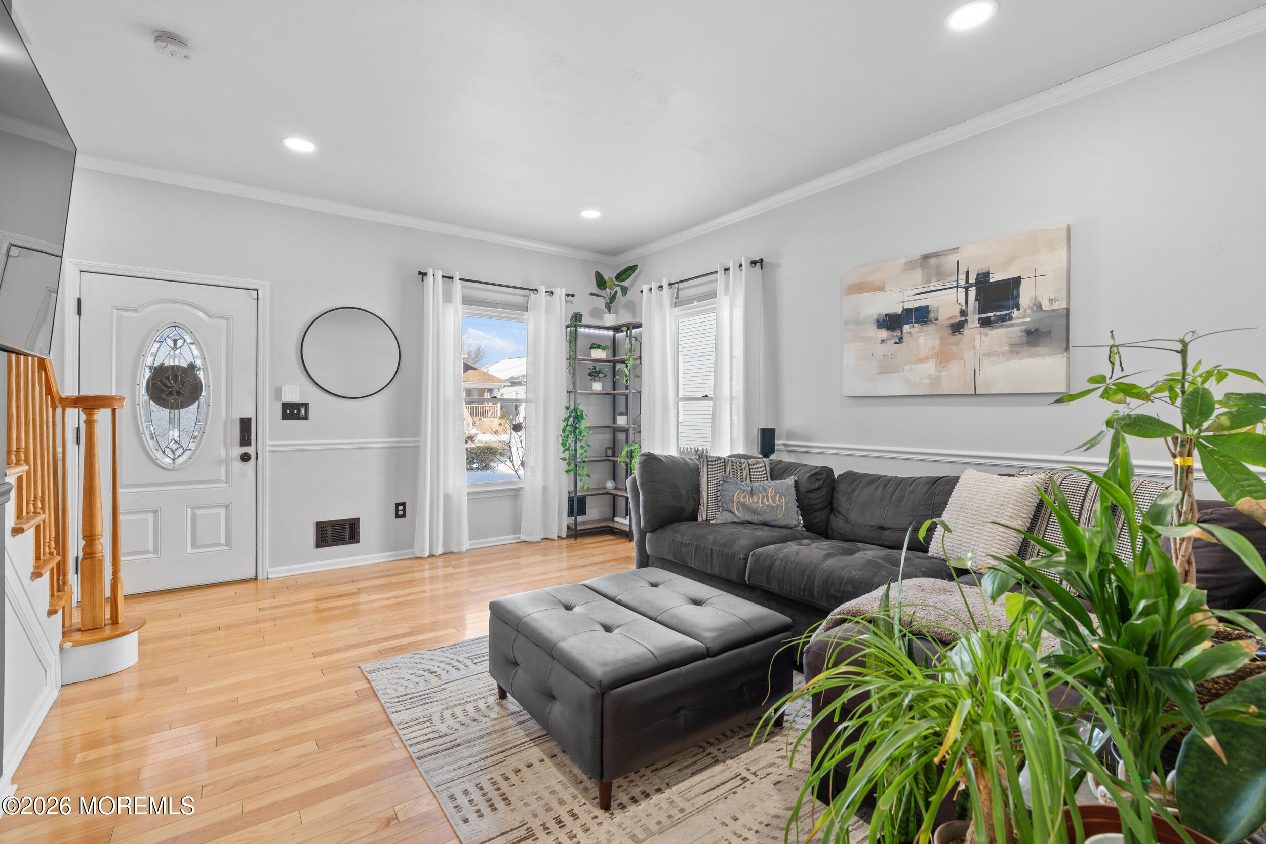 207 Lower Main Street Matawan, NJ 07747 - Photo 9 of 19 a living room with furniture and a large window