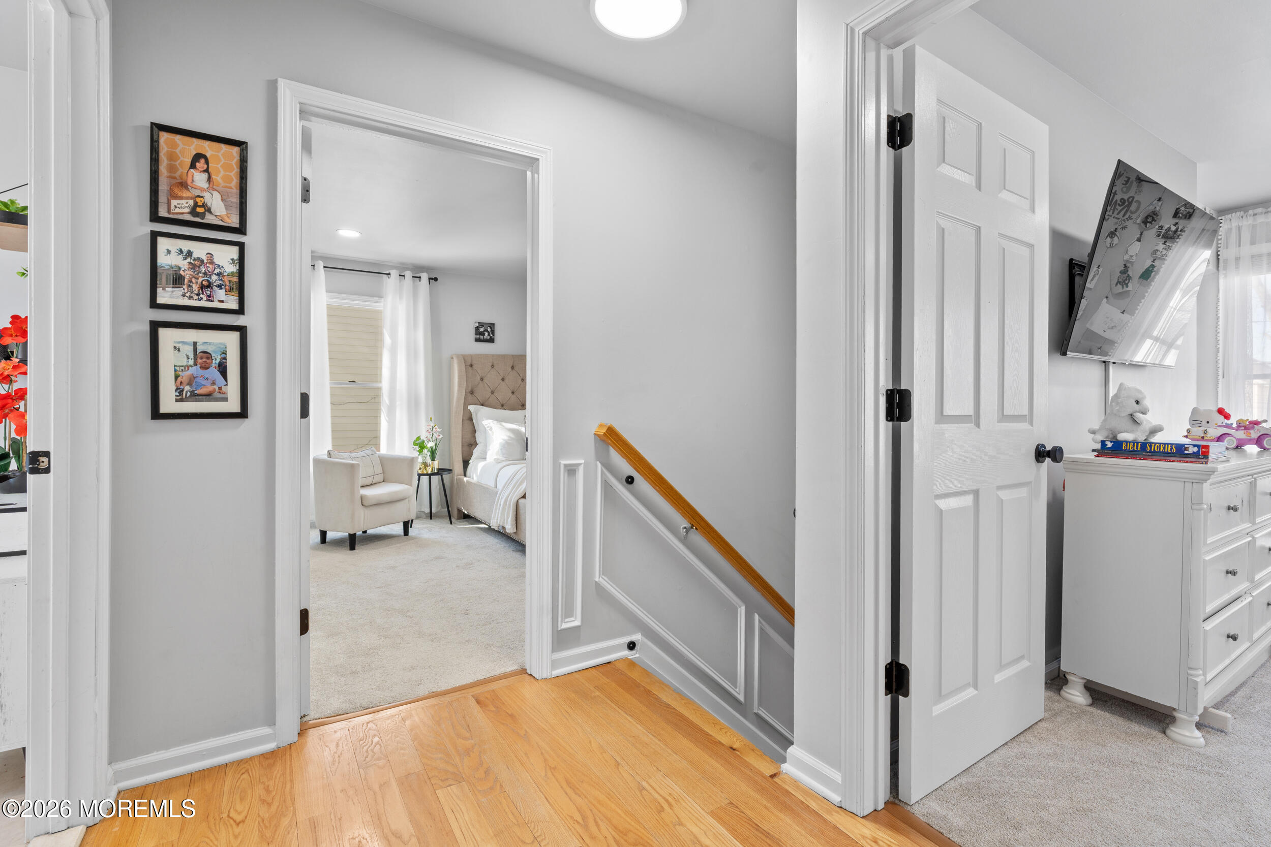 207 Lower Main Street Matawan, NJ 07747 - Photo 10 of 19 a very nice looking room with a wooden floor and a bathroom