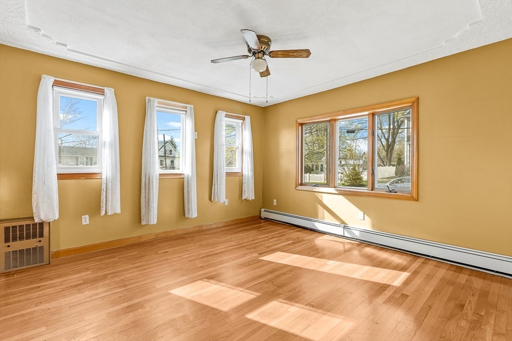 15 Tremont Street Stoneham, MA 02180 - Photo 12 of 38 a view of an empty room with a window