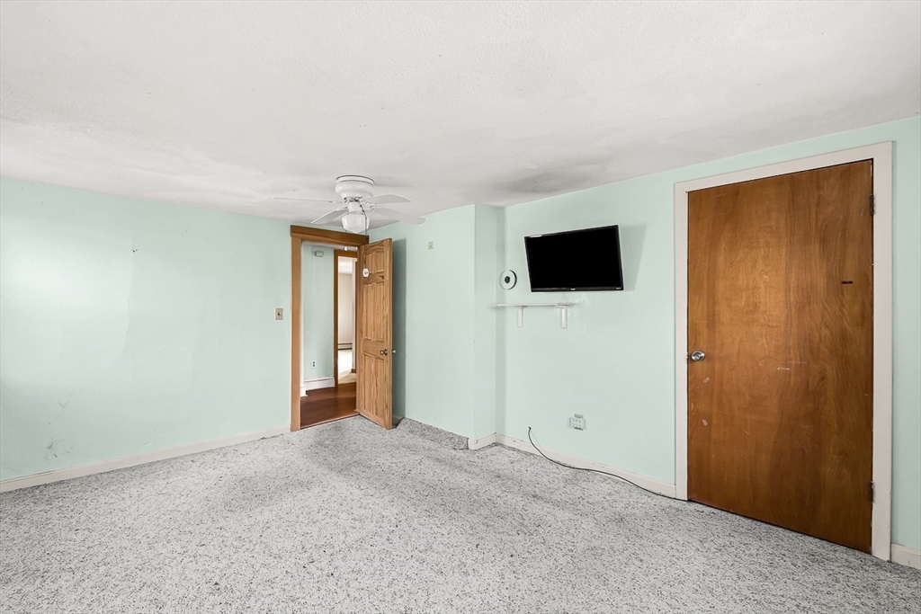15 Tremont Street Stoneham, MA 02180 - Photo 28 of 38 a view of an empty room with glass door