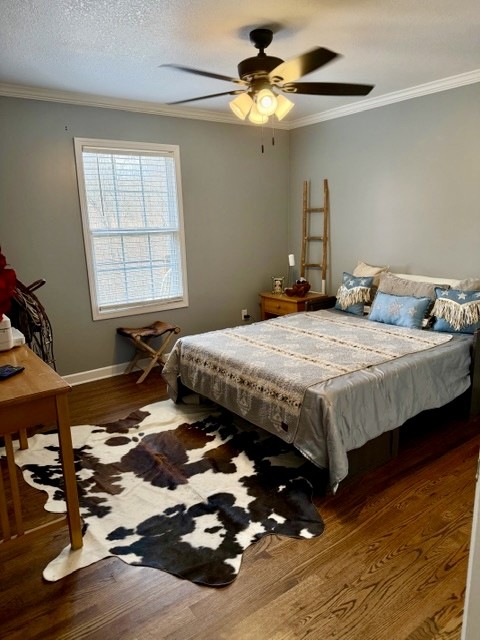 1198 Ed Sanders Road Lynchburg, TN 37352 - Photo 17 of 32 a bedroom with a bed and a chandelier