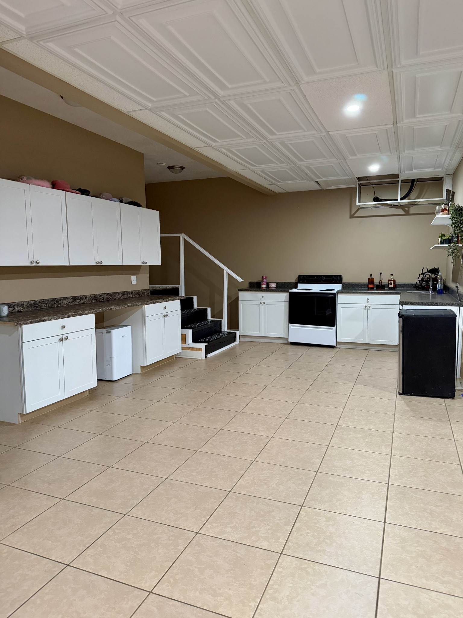 1198 Ed Sanders Road Lynchburg, TN 37352 - Photo 20 of 32 a kitchen with stainless steel appliances cabinets a sink and a stove
