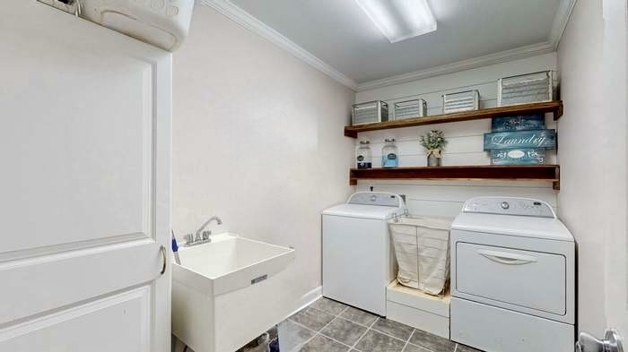 1198 Ed Sanders Road Lynchburg, TN 37352 - Photo 22 of 36 a utility room with dryer and washer