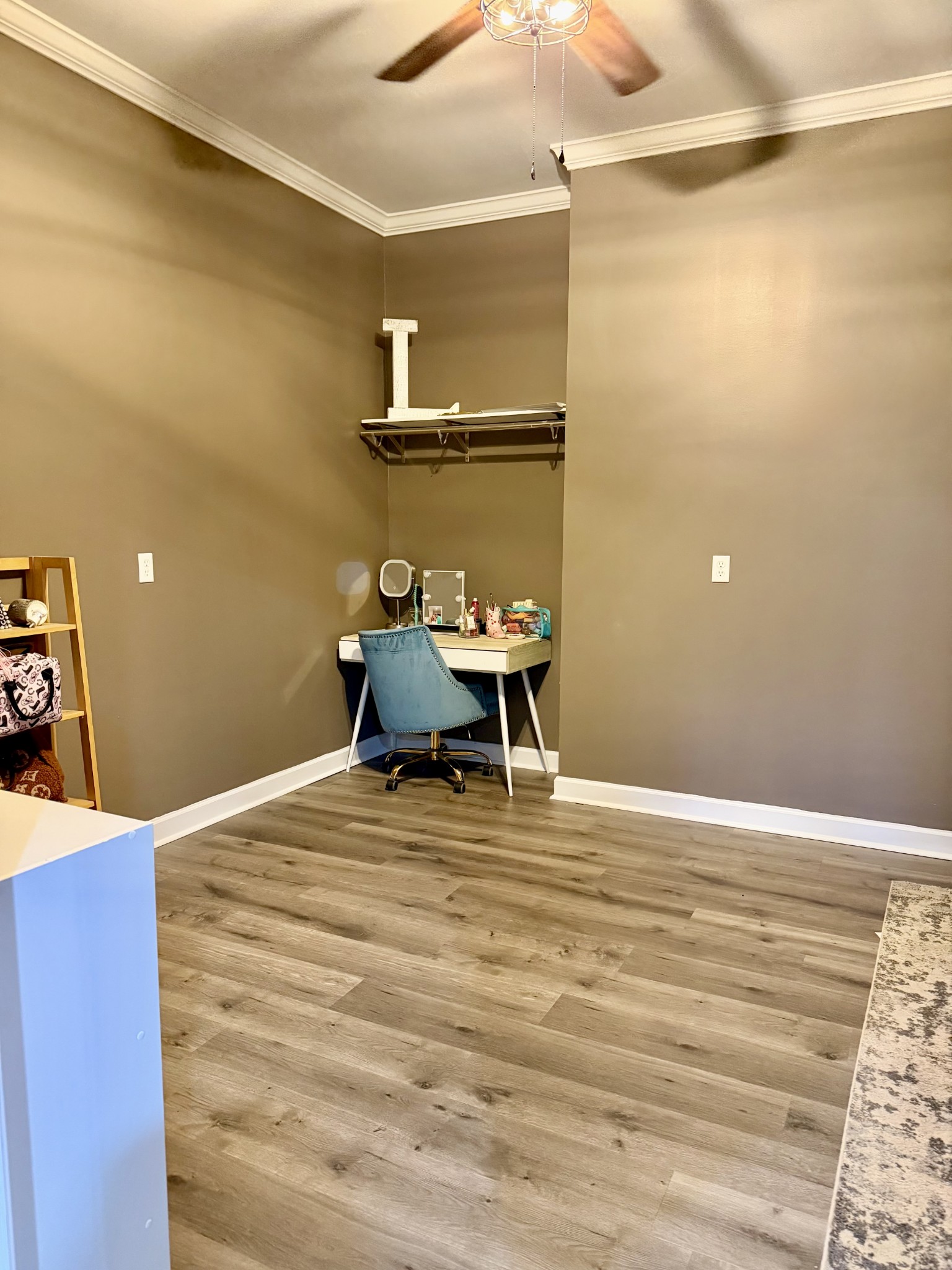 1198 Ed Sanders Road Lynchburg, TN 37352 - Photo 23 of 36 a room with a wooden floor and furniture