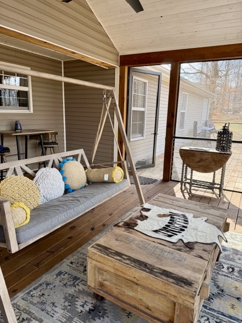 1198 Ed Sanders Road Lynchburg, TN 37352 - Photo 24 of 36 a living room filled with furniture and a table