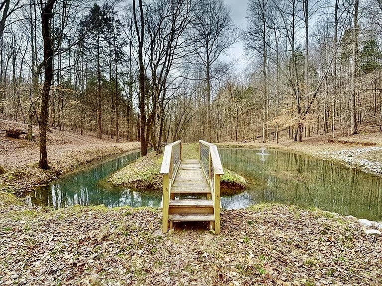 1198 Ed Sanders Road Lynchburg, TN 37352 - Photo 28 of 36 a view of a lake with houses
