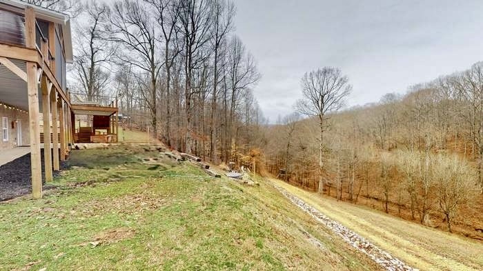 1198 Ed Sanders Road Lynchburg, TN 37352 - Photo 30 of 36 a view of a backyard of the house