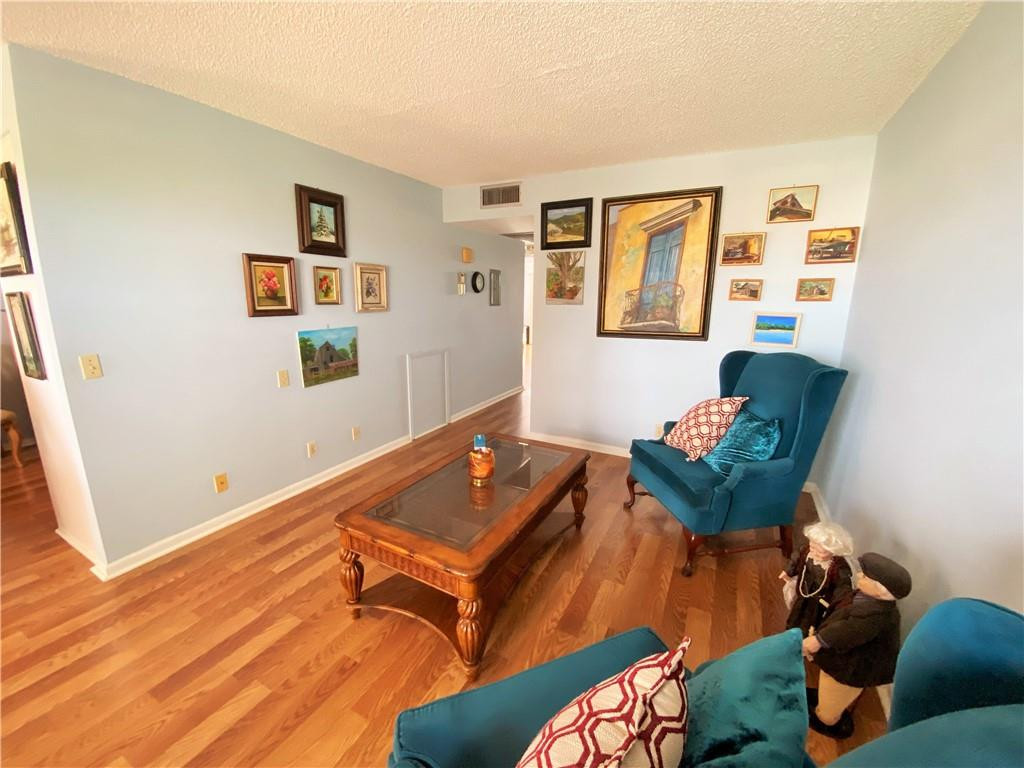4055 Newcastle A, Unit 4055 Boca Raton, FL 33434 - Photo 5 of 23 a living room with furniture and a window