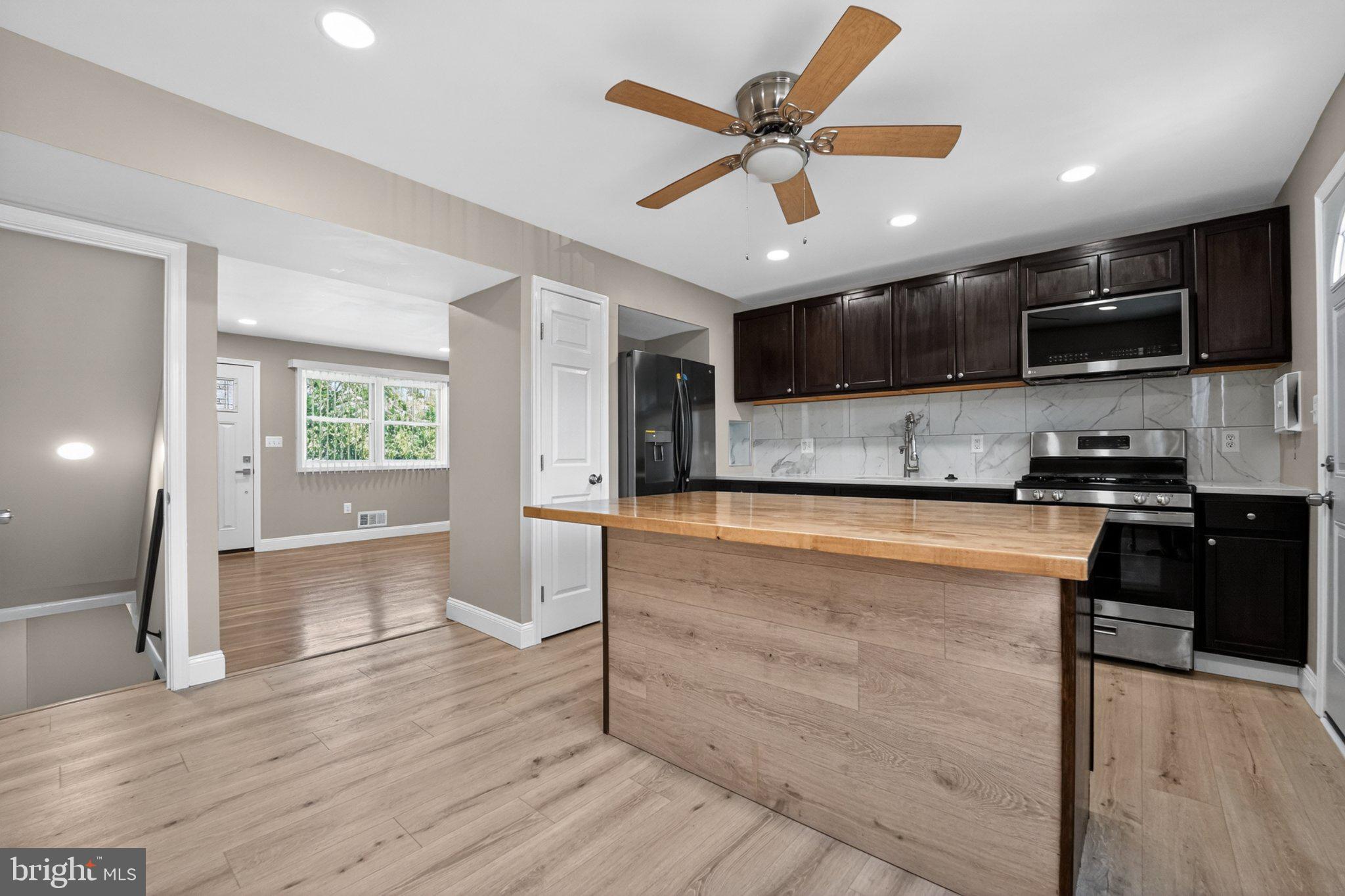643 South Wickham Road Baltimore, MD 21229 - Photo 7 of 32 Modern kitchen with sleek finishes.