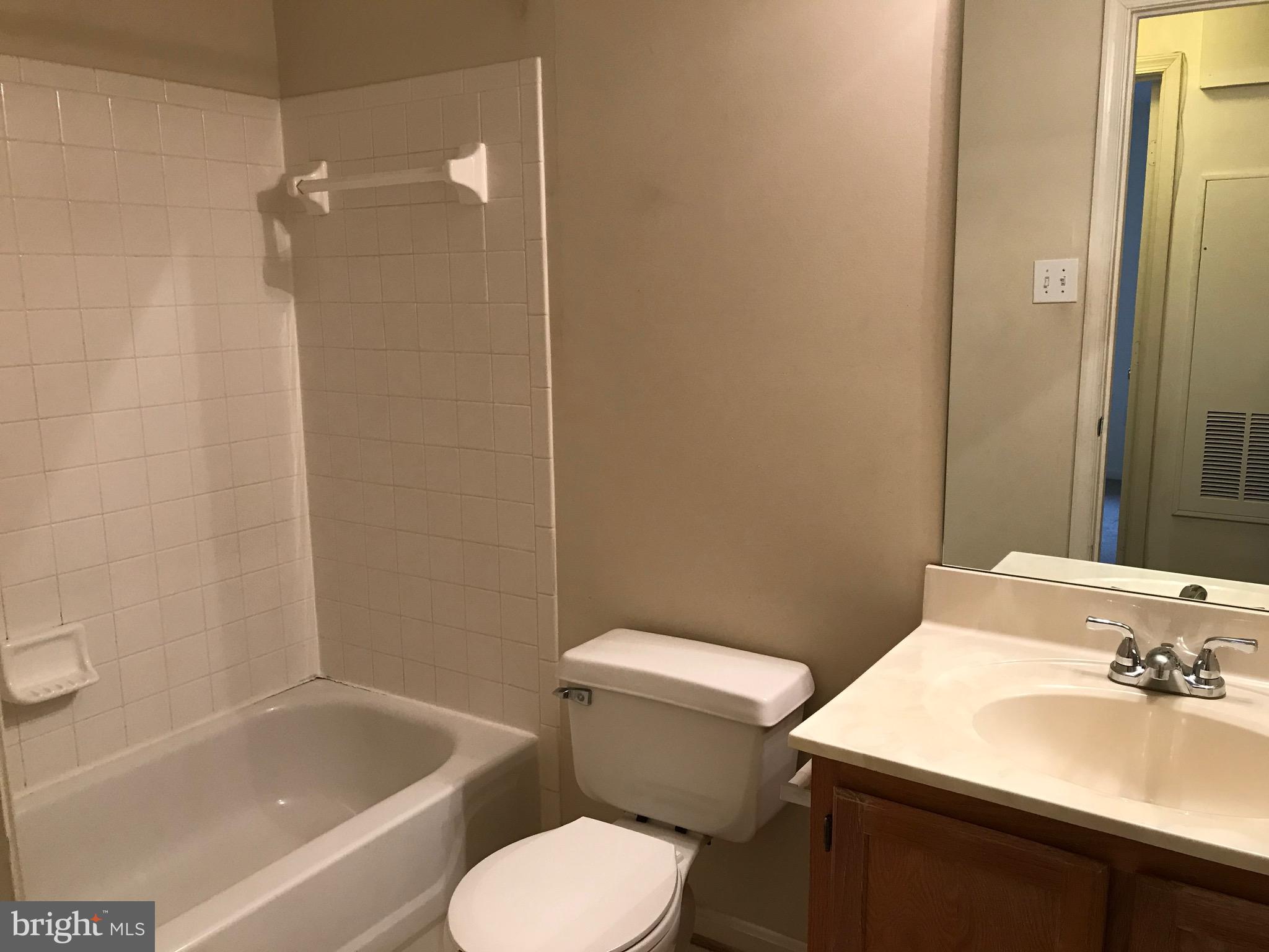 14202 Valleyfield Drive, Unit 8 Silver Spring, MD 20906 - Photo 11 of 19 Hallway bathroom