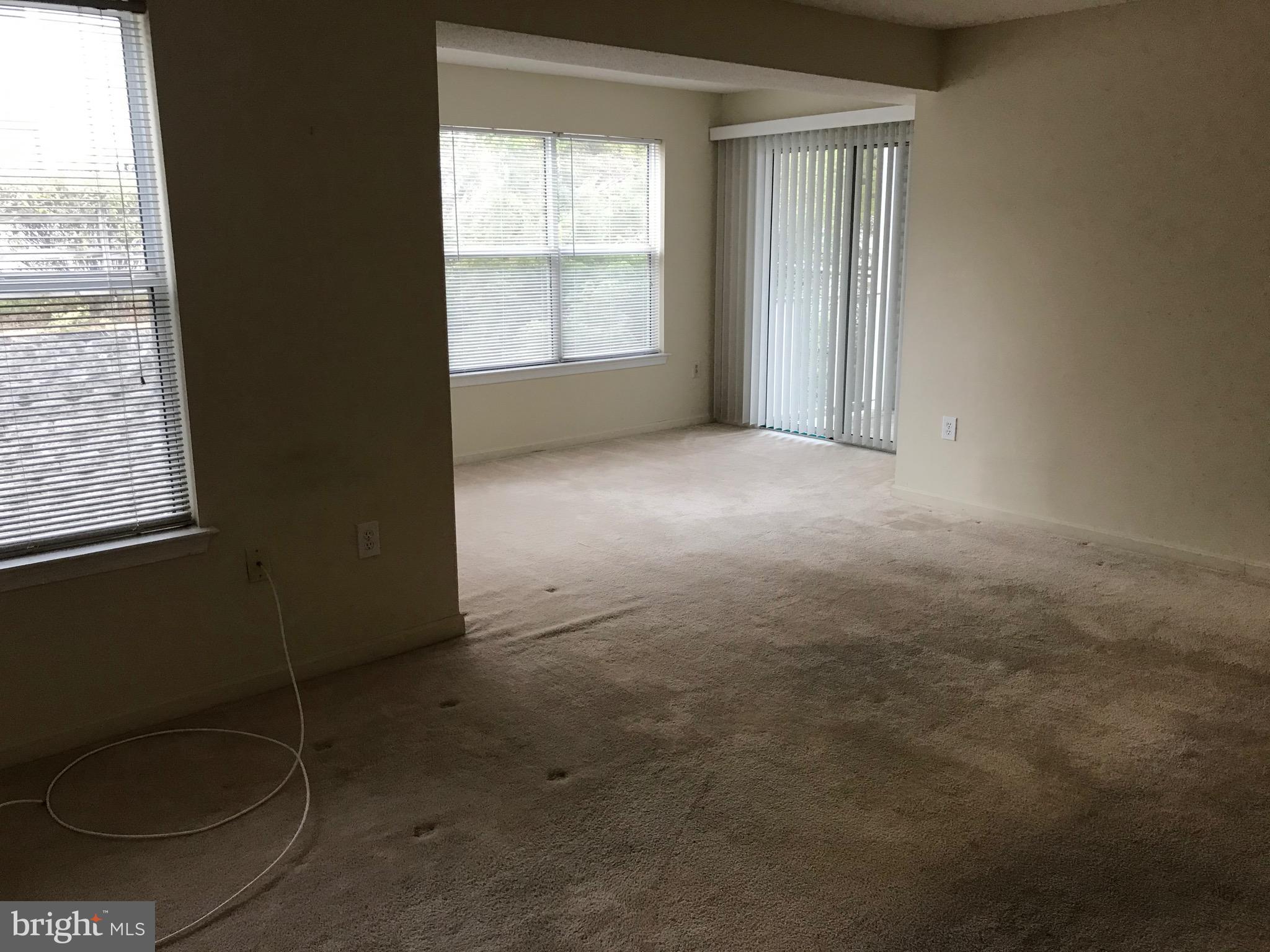 14202 Valleyfield Drive, Unit 8 Silver Spring, MD 20906 - Photo 5 of 19 Living room / dining room