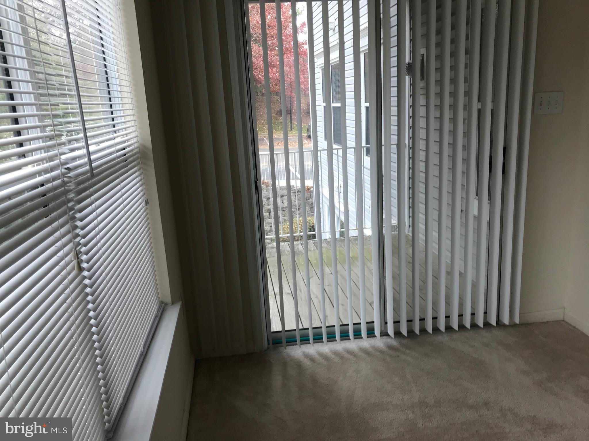 14202 Valleyfield Drive, Unit 8 Silver Spring, MD 20906 - Photo 6 of 19 Dining room / view of the deck