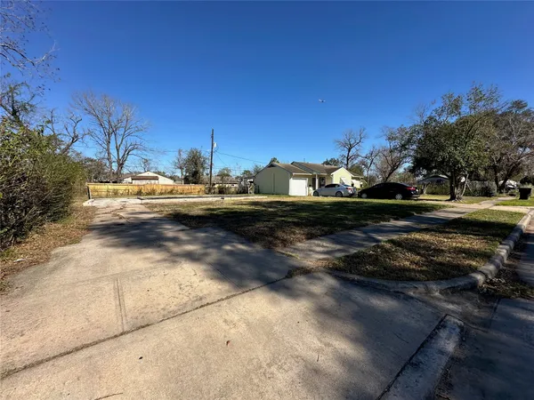 a view of a yard with an outdoor space