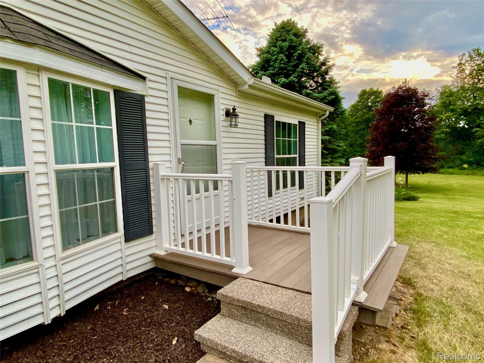 2914 East Hunters Creek Road Metamora, MI 48455 - Photo 4 of 33 Front Porch Entry