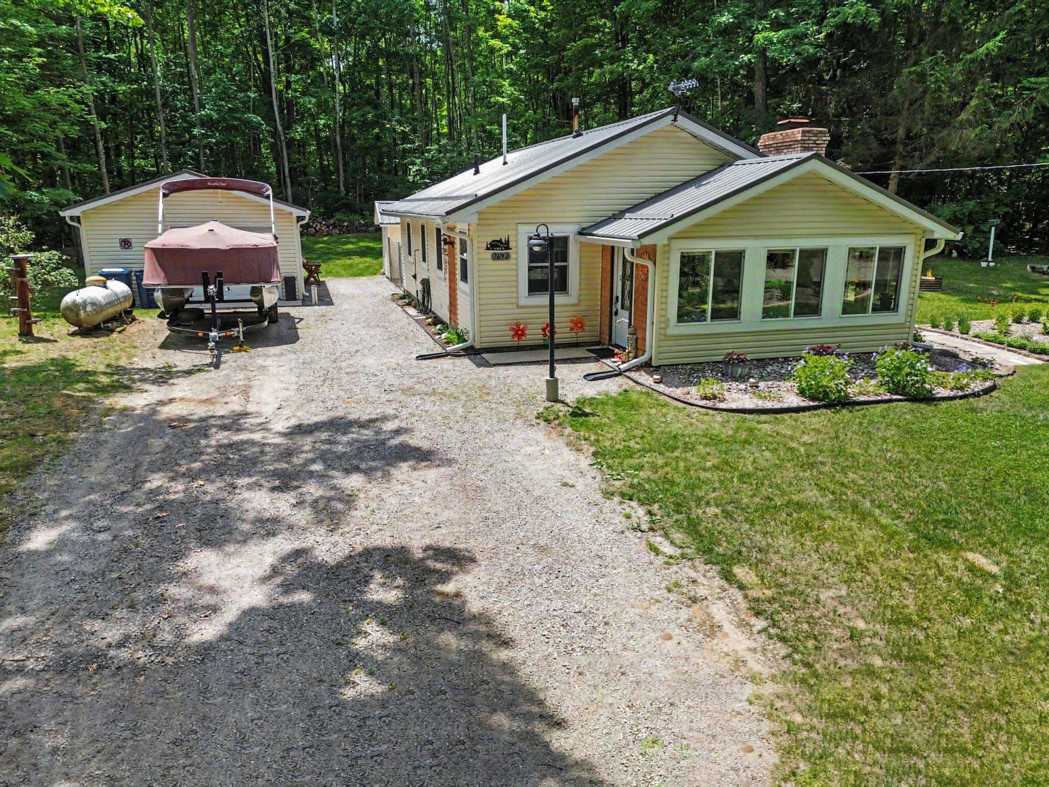 7692 Lakeview Street Harrison, MI 48625 - Photo 20 of 21 1947358-c7a2a26a-1d11-4b14-9a47-b19fc693ea19.JPG