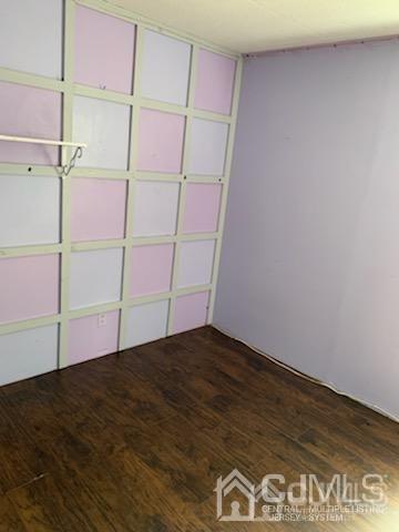 15 Burns Road North Brunswick, NJ 08902 - Photo 14 of 26 an empty room with wooden floor