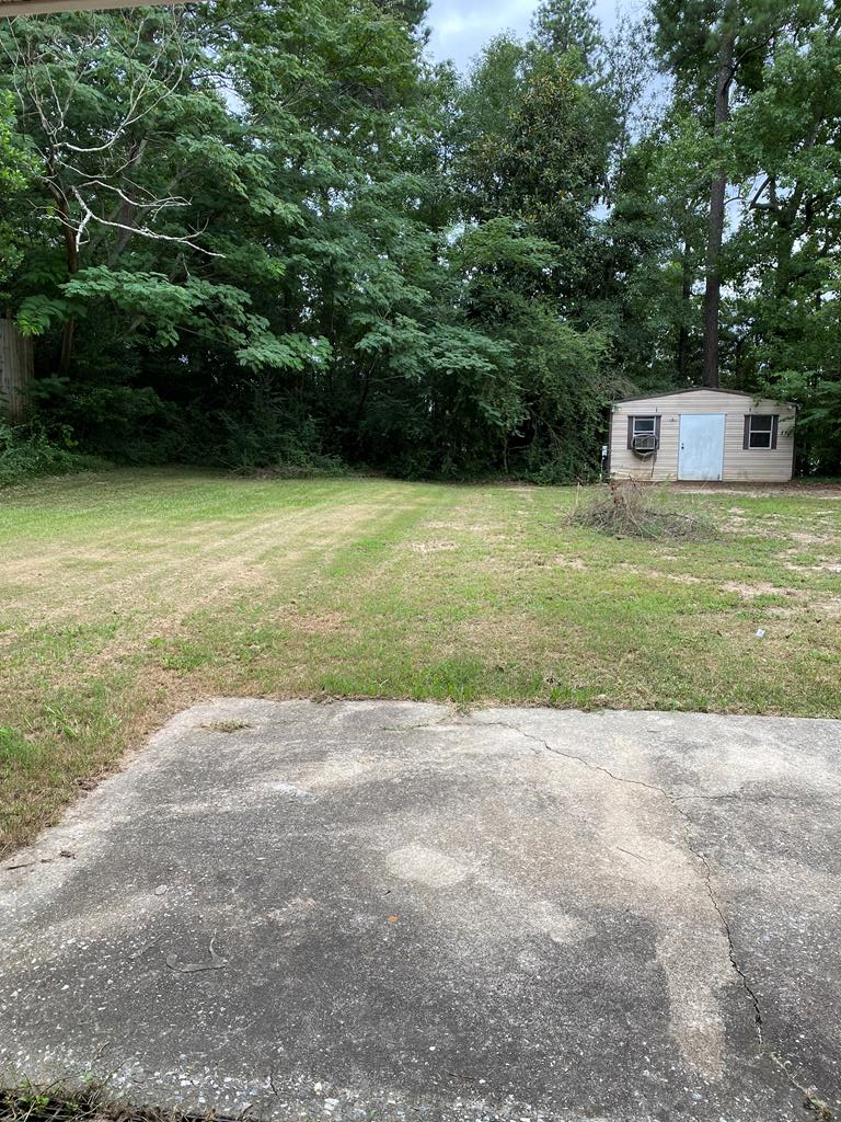 1609 4th Place Phenix City, AL 36869 - Photo 13 of 14 a view of a outdoor space with a house