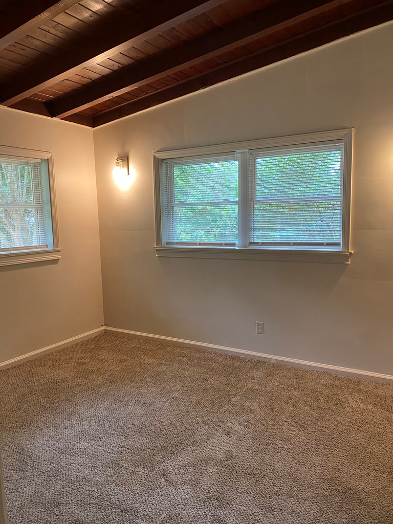 1609 4th Place Phenix City, AL 36869 - Photo 10 of 14 a view of an empty room with a window
