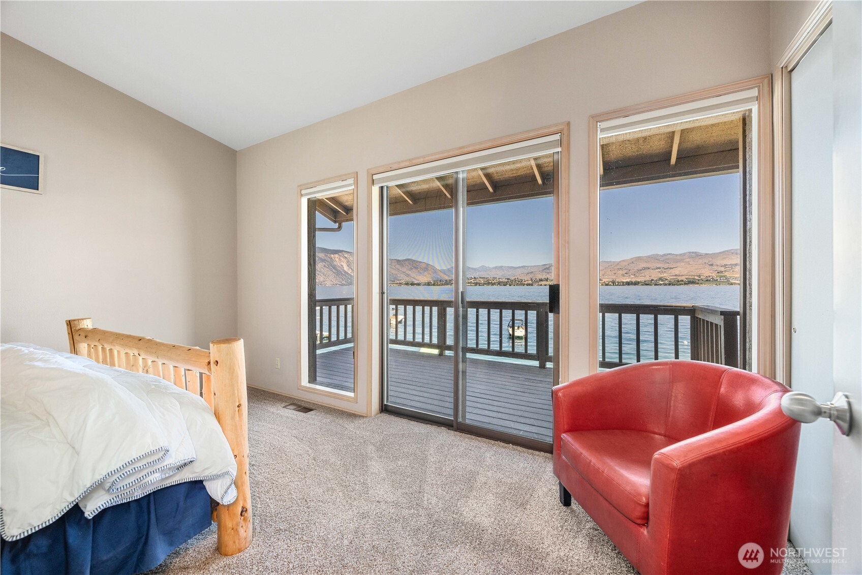 3150 South Lakeshore Road Chelan, WA 98816 - Photo 16 of 36 a bedroom with furniture and a window