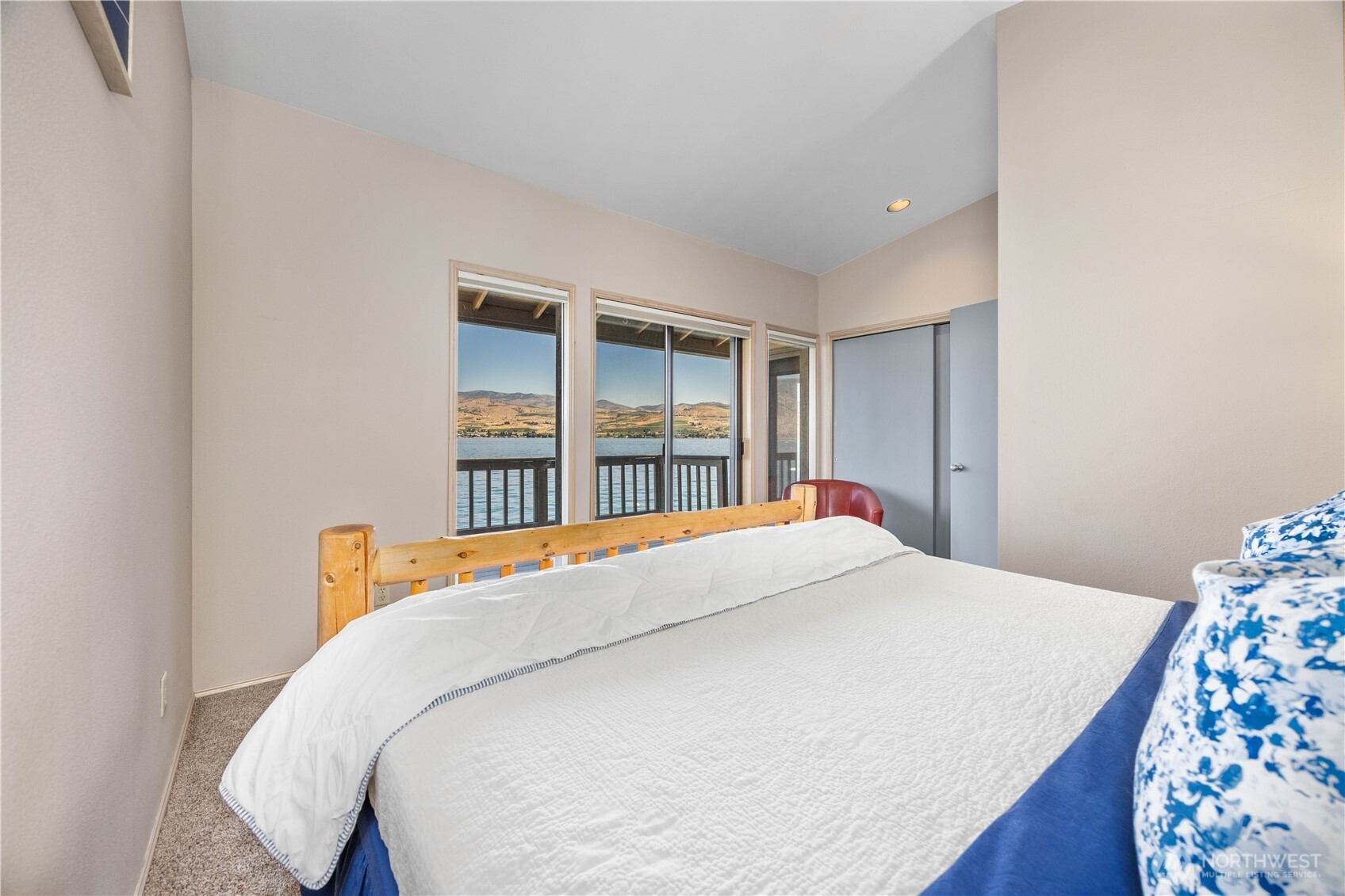 3150 South Lakeshore Road Chelan, WA 98816 - Photo 18 of 36 a bedroom with a bed and a window