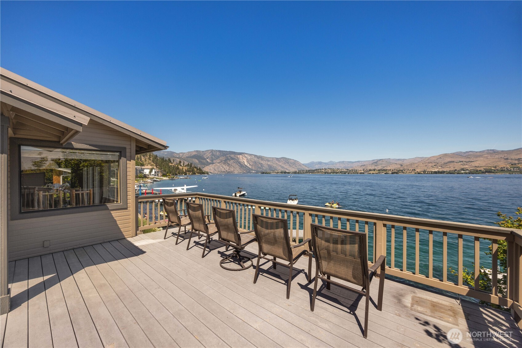 3150 South Lakeshore Road Chelan, WA 98816 - Photo 6 of 36 a view of a balcony with chairs