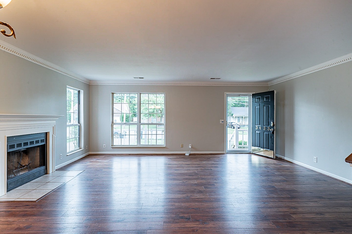3433 Country Way Road Antioch, TN 37013 - Photo 11 of 29 a view of an empty room with wooden floor and a window