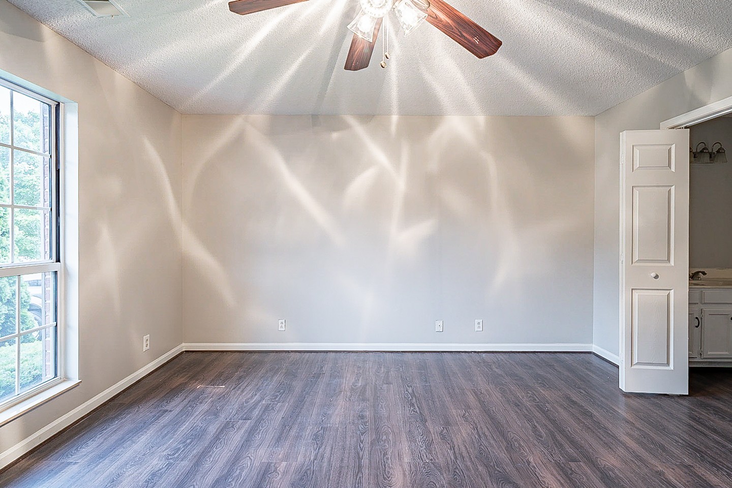 3433 Country Way Road Antioch, TN 37013 - Photo 13 of 29 a view of an empty room with wooden floor and a window