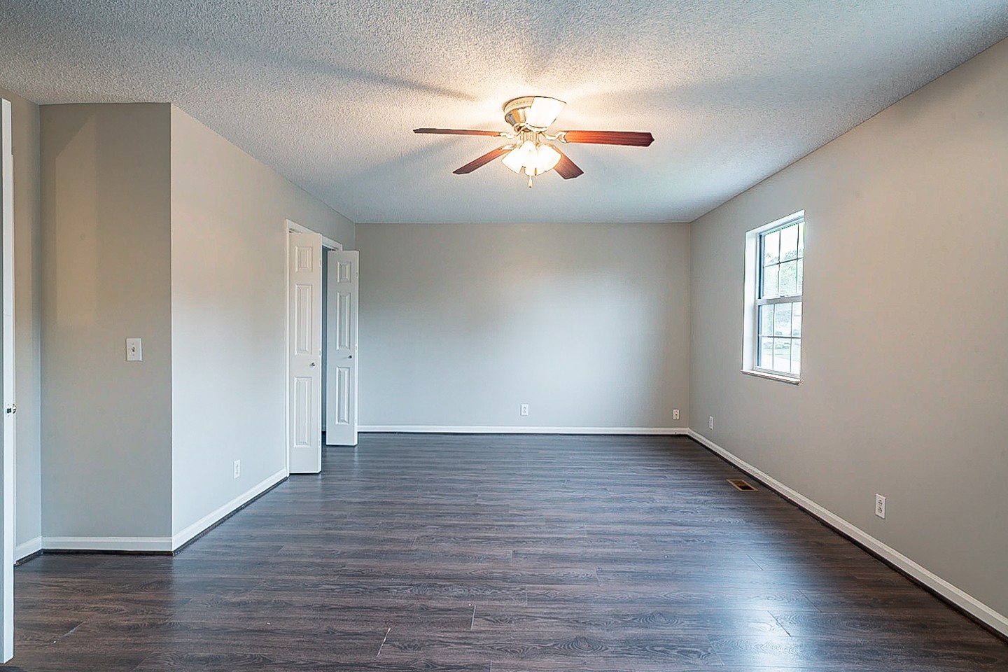 3433 Country Way Road Antioch, TN 37013 - Photo 23 of 29 a view of an empty room with wooden floor and a window